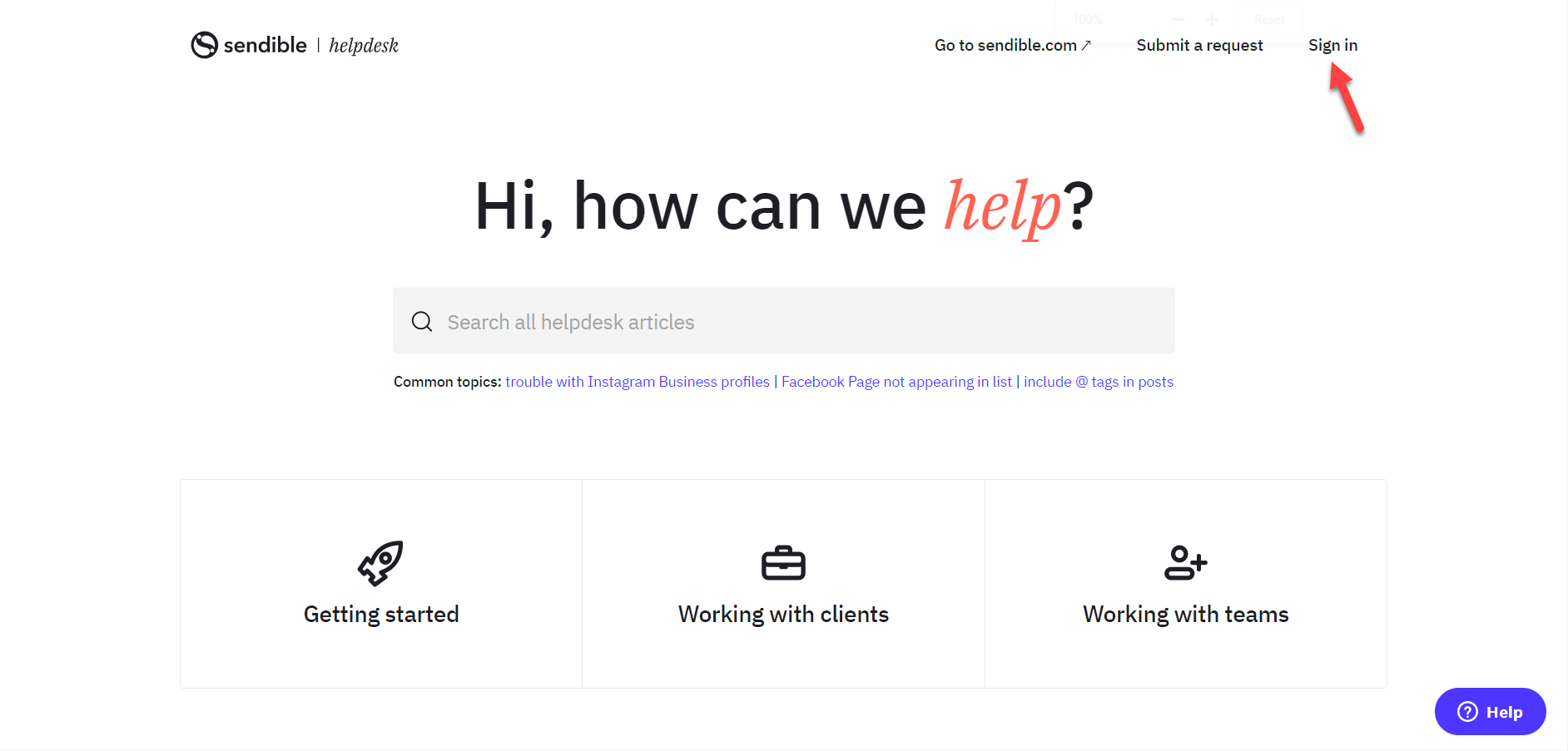 The sign in option on the top right of the helpdesk is pointed out with an orange arrow